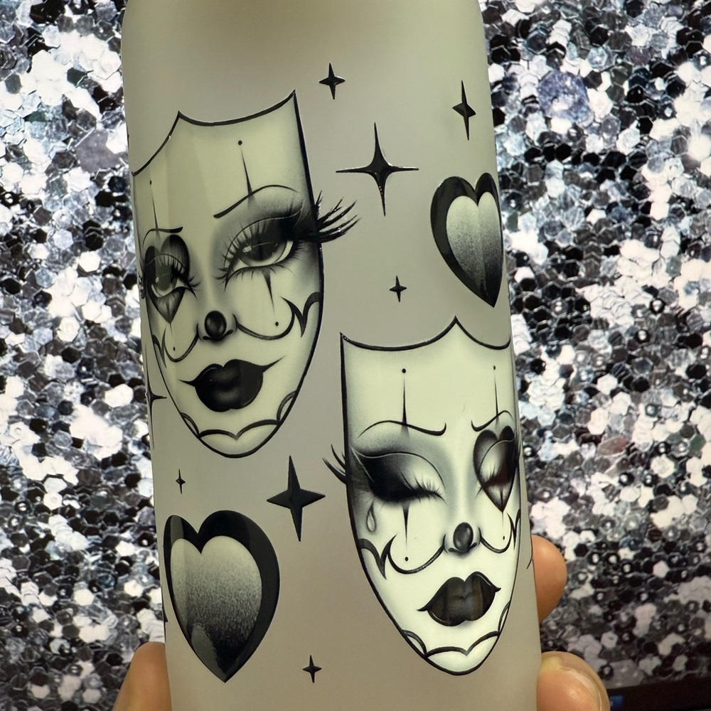 Frosted Glass Bottle with Black Clown Faces